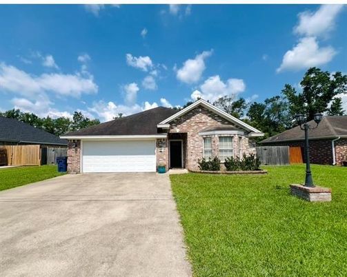 Attached, Backyard, Exterior, Facade, Brick Facade, Ranch