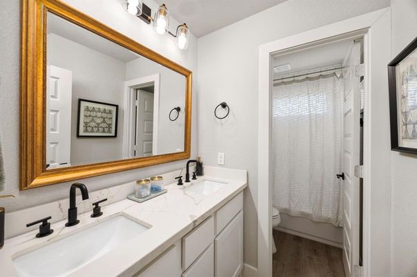 Bathroom, Dual Sink Vanities, Glass Shower, Interior, Wood Texture Flooring