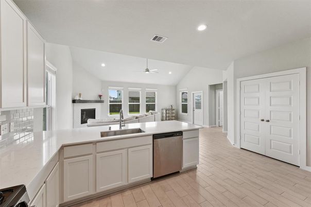 Fireplace, Interior, Kitchen, Recessed Lighting, Wood Texture Flooring
