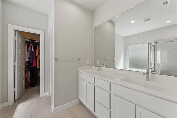 Bathroom, Dual Sink Vanities, Interior, Recessed Lighting, Walk-in Closets, Wood Texture Flooring