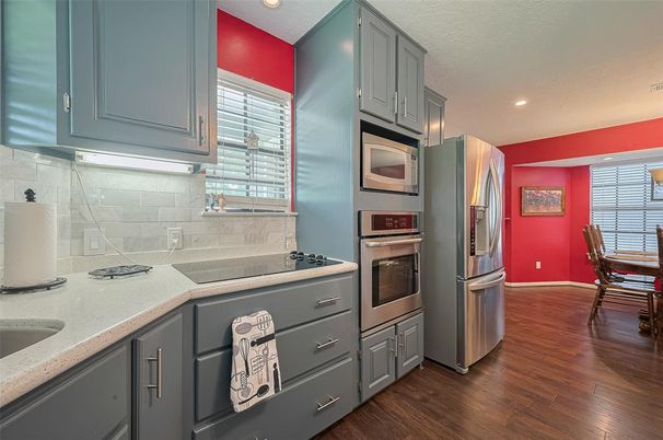 Dining room, Interior, Kitchen, Recessed Lighting, Stainless Steel Appliances, Wood Texture Flooring
