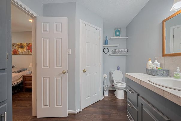Bathroom, Bedroom, Interior, Recessed Lighting, Tile Countertops, Wood Texture Flooring