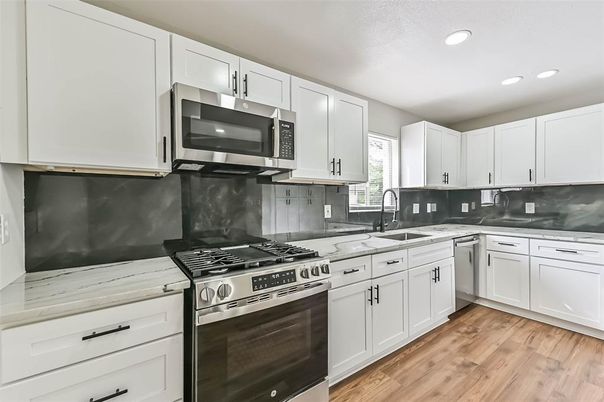 Interior, Kitchen, Recessed Lighting, Stainless Steel Appliances, Wood Texture Flooring