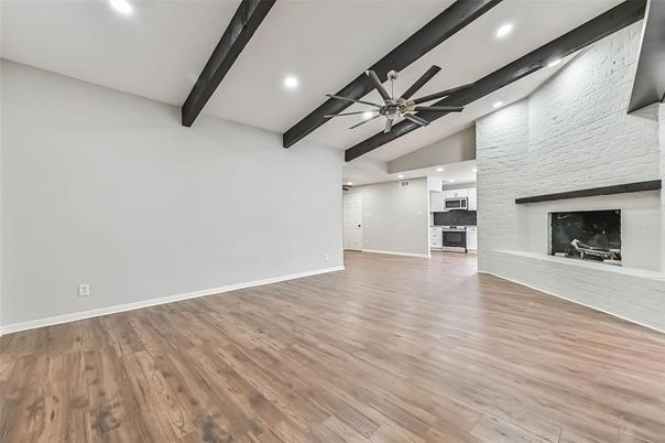 Empty room, Fireplace, Interior, Recessed Lighting, Wooden Beams, Wood Texture Flooring
