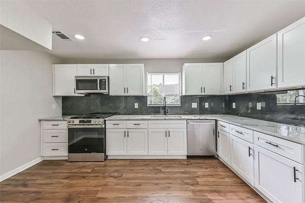 Interior, Kitchen, Recessed Lighting, Stainless Steel Appliances, Wood Texture Flooring