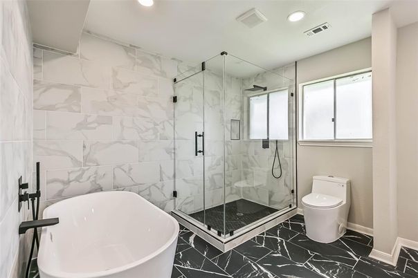 Bathroom, Free Standing Baths, Glass Shower, Interior, Marble, Marble Walls, Recessed Lighting