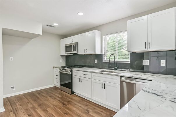 Interior, Kitchen, Recessed Lighting, Stainless Steel Appliances, Wood Texture Flooring