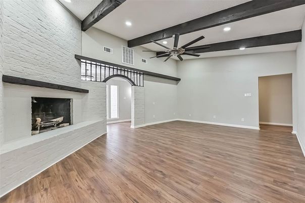 Empty room, Fireplace, Interior, Recessed Lighting, Wooden Beams, Wood Texture Flooring