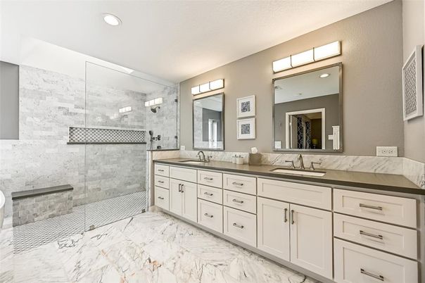 Bathroom, Dual Sink Vanities, Glass Shower, Interior, Marble, Marble Walls, Recessed Lighting