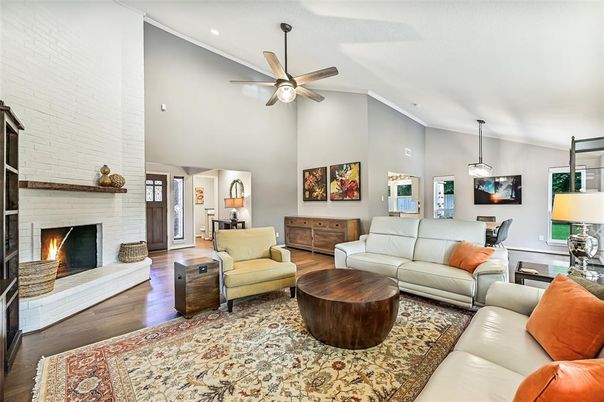 Fireplace, Interior, Living room, Pendant Lights, Recessed Lighting, Stone Walls, Wood Texture Flooring