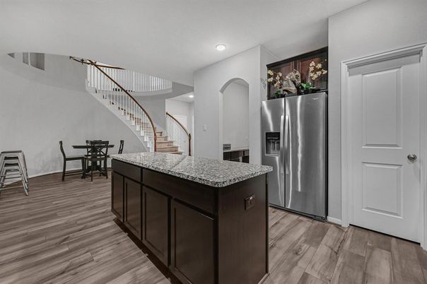 Dining room, Interior, Kitchen, Recessed Lighting, Stainless Steel Appliances, Wood Texture Flooring