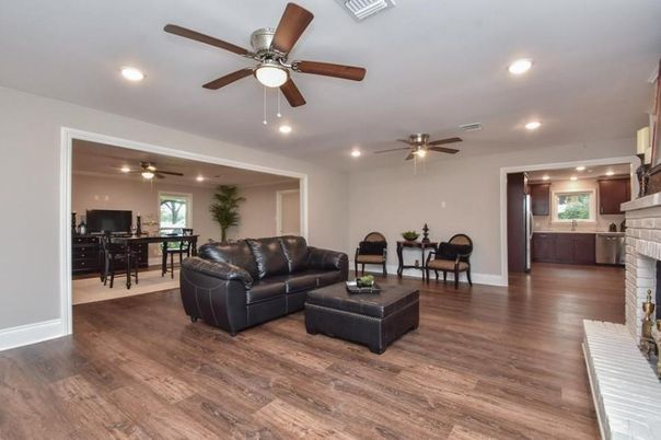 Dining room, Fireplace, Interior, Living room, Recessed Lighting, Wood Texture Flooring