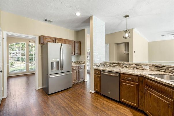 Interior, Kitchen, Pendant Lights, Recessed Lighting, Stainless Steel Appliances, Wood Texture Flooring