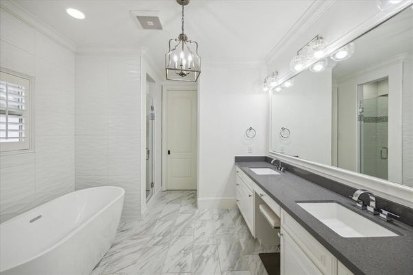 Bathroom, Dual Sink Vanities, Free Standing Baths, Interior, Marble, Pendant Lights, Recessed Lighting