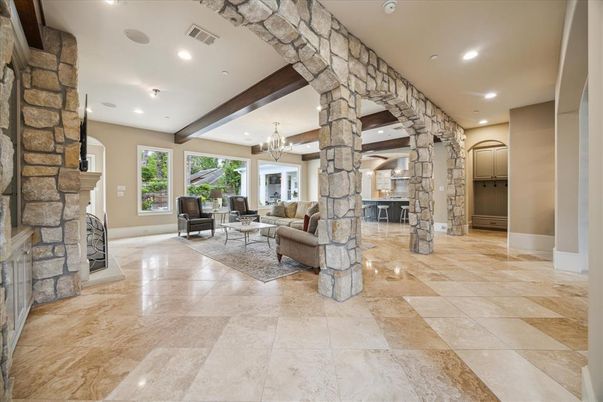 Chandelier, Fireplace, Interior, Living room, Recessed Lighting, Stone Walls, Wooden Beams