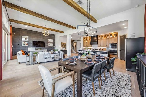 Chandelier, Dining room, Interior, Kitchen, Living room, Pendant Lights, Recessed Lighting, Stainless Steel Appliances, Wooden Beams, Wood Texture Flooring