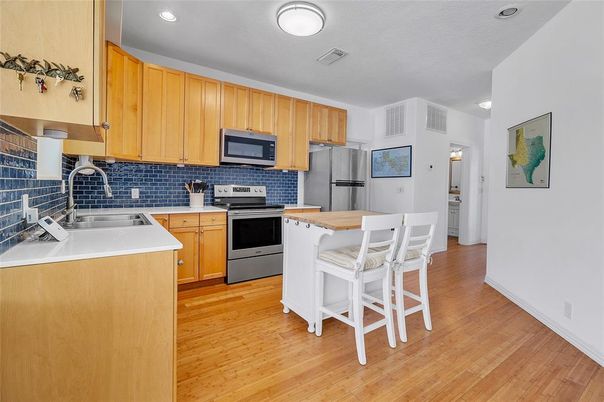 Interior, Kitchen, Recessed Lighting, Stainless Steel Appliances, Wood Texture Flooring