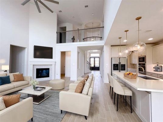 Fireplace, Interior, Kitchen, Living room, Pendant Lights, Recessed Lighting, Stainless Steel Appliances, Wood Texture Flooring