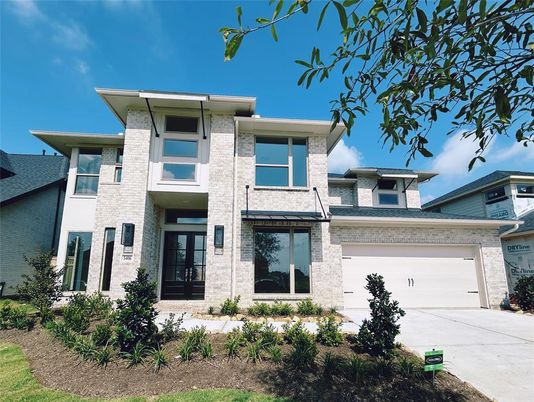 Attached, Exterior, Facade, Brick Facade, Modern