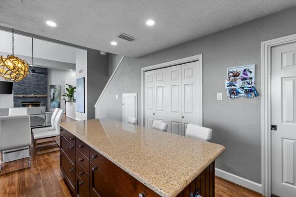 Dining room, Fireplace, Interior, Pendant Lights, Recessed Lighting, Wood Texture Flooring