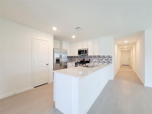 Interior, Kitchen, Recessed Lighting, Stainless Steel Appliances, Wood Texture Flooring