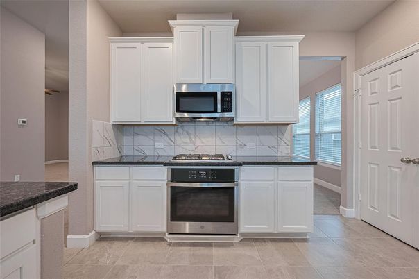Interior, Kitchen, Marble Walls, Stainless Steel Appliances
