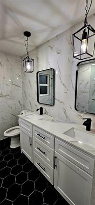 Bathroom, Dual Sink Vanities, Interior, Marble Walls, Pendant Lights