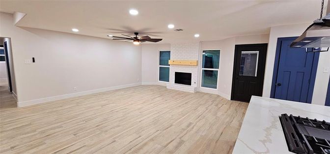 Empty room, Fireplace, Interior, Recessed Lighting, Wood Texture Flooring