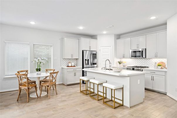 Dining room, Interior, Kitchen, Recessed Lighting, Stainless Steel Appliances, Wood Texture Flooring