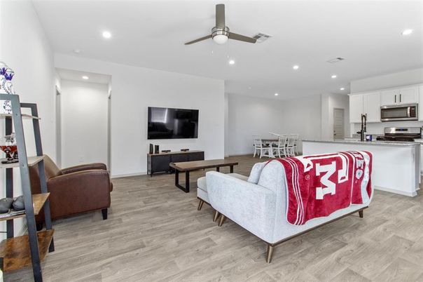 Dining room, Interior, Kitchen, Living room, Recessed Lighting, Stainless Steel Appliances, Wood Texture Flooring
