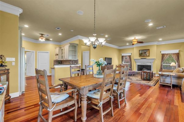 Chandelier, Dining room, Fireplace, Interior, Living room, Recessed Lighting, Wood Texture Flooring