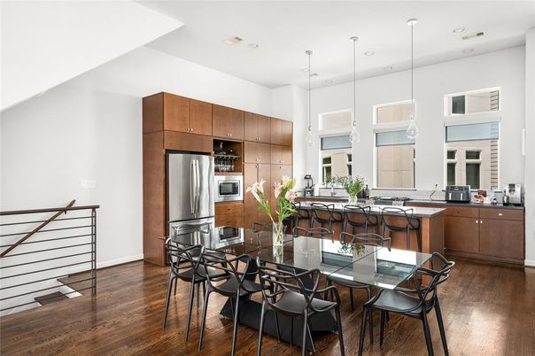 Dining room, Interior, Kitchen, Pendant Lights, Recessed Lighting, Stainless Steel Appliances, Wood Texture Flooring