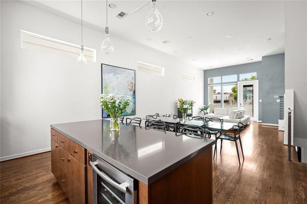 Dining room, Interior, Kitchen, Living room, Pendant Lights, Recessed Lighting, Stainless Steel Appliances, Wood Texture Flooring