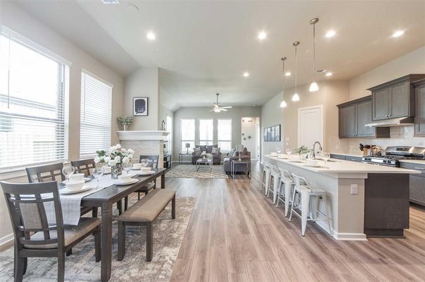 Dining room, Fireplace, Interior, Kitchen, Living room, Pendant Lights, Recessed Lighting, Stainless Steel Appliances, Wood Texture Flooring