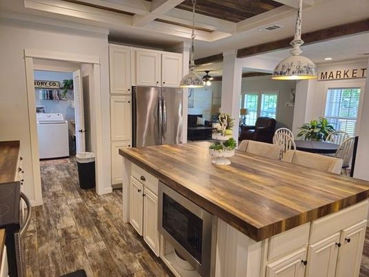 Chandelier, Interior, Kitchen, Pendant Lights, Recessed Lighting, Stainless Steel Appliances, Washer, Wooden Beams, Wood Texture Flooring
