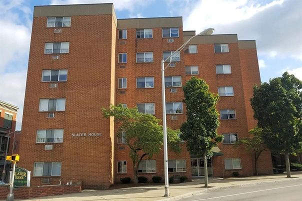 Exterior, Facade, Brick Facade, Condo Building