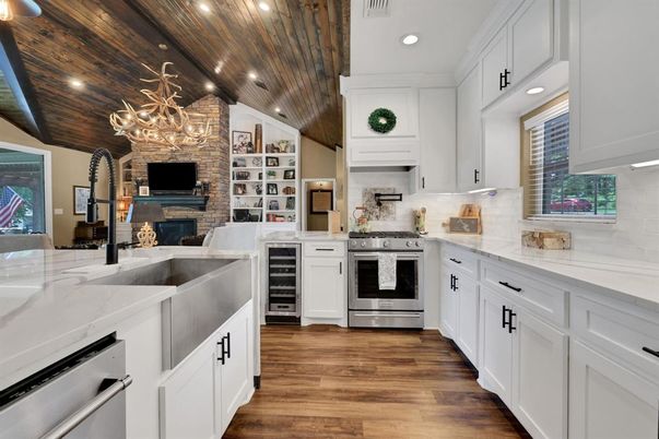 Fireplace, Interior, Kitchen, Recessed Lighting, Stainless Steel Appliances, Stone Walls, Wooden Ceilings, Wood Texture Flooring