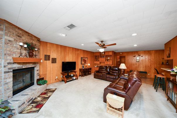 Dining room, Fireplace, Interior, Living room, Recessed Lighting, Stone Walls, Wooden Walls