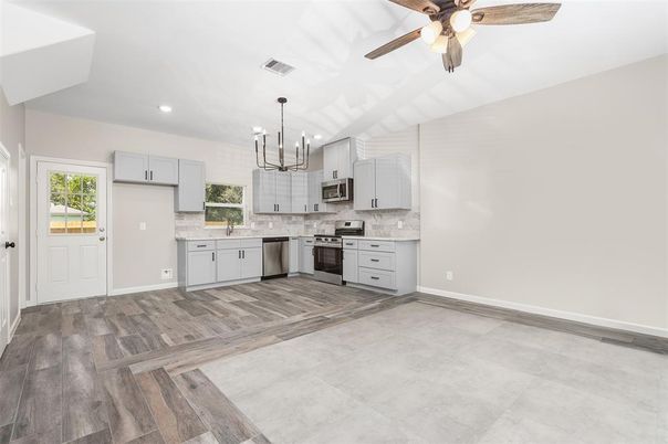 Chandelier, Interior, Kitchen, Pendant Lights, Recessed Lighting, Stainless Steel Appliances, Wood Texture Flooring