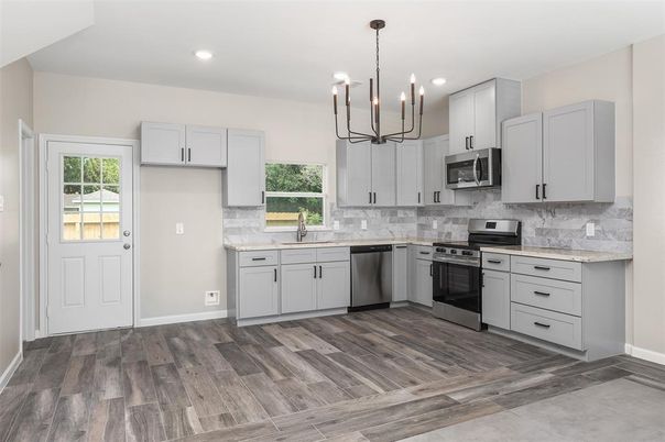 Interior, Kitchen, Pendant Lights, Recessed Lighting, Stainless Steel Appliances, Wood Texture Flooring