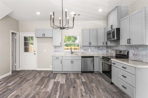 Chandelier, Interior, Kitchen, Pendant Lights, Recessed Lighting, Stainless Steel Appliances, Wood Texture Flooring