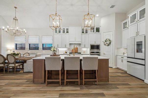 Chandelier, Dining room, Interior, Kitchen, Pendant Lights, Recessed Lighting, Stainless Steel Appliances, Wood Texture Flooring