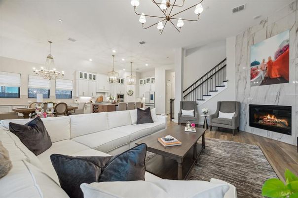 Chandelier, Dining room, Fireplace, Interior, Kitchen, Living room, Pendant Lights, Recessed Lighting, Wood Texture Flooring