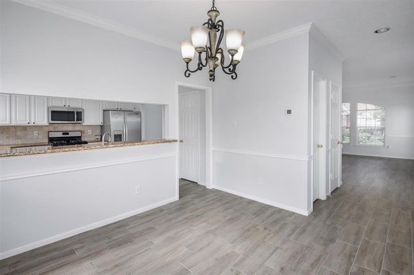 Chandelier, Interior, Kitchen, Recessed Lighting, Stainless Steel Appliances, Wood Texture Flooring