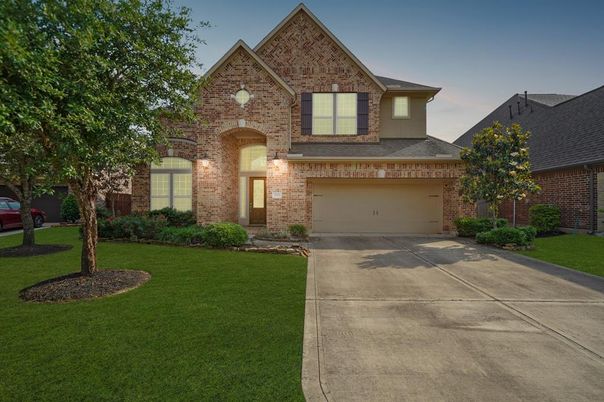 Attached, Exterior, Facade, Brick Facade, Brick Traditional