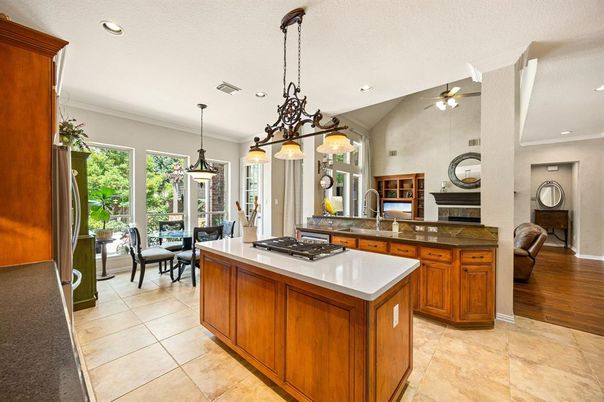 Chandelier, Dining room, Fireplace, Interior, Kitchen, Pendant Lights, Recessed Lighting, Wood Texture Flooring