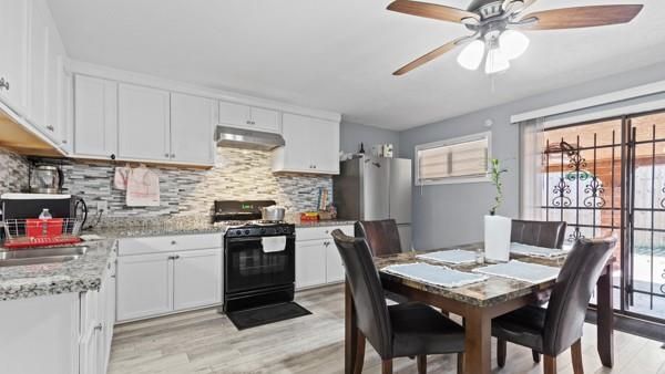 Dining room, Interior, Kitchen, Stainless Steel Appliances, Stone Walls, Wood Texture Flooring