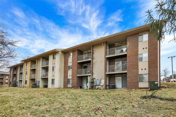 Backyard, Exterior, Facade, Brick Facade, Condo Building