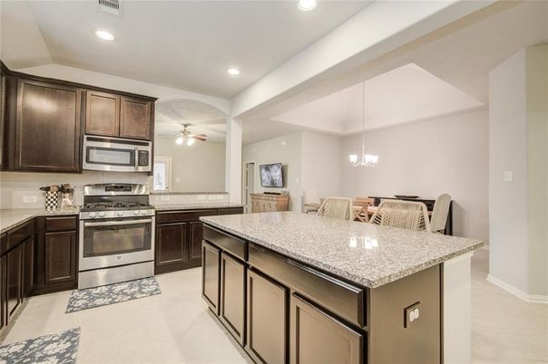 Chandelier, Dining room, Interior, Kitchen, Pendant Lights, Recessed Lighting, Stainless Steel Appliances