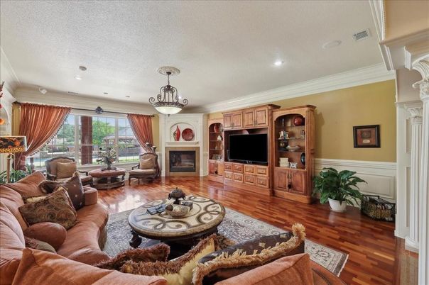 Chandelier, Fireplace, Interior, Living room, Recessed Lighting, Wood Texture Flooring